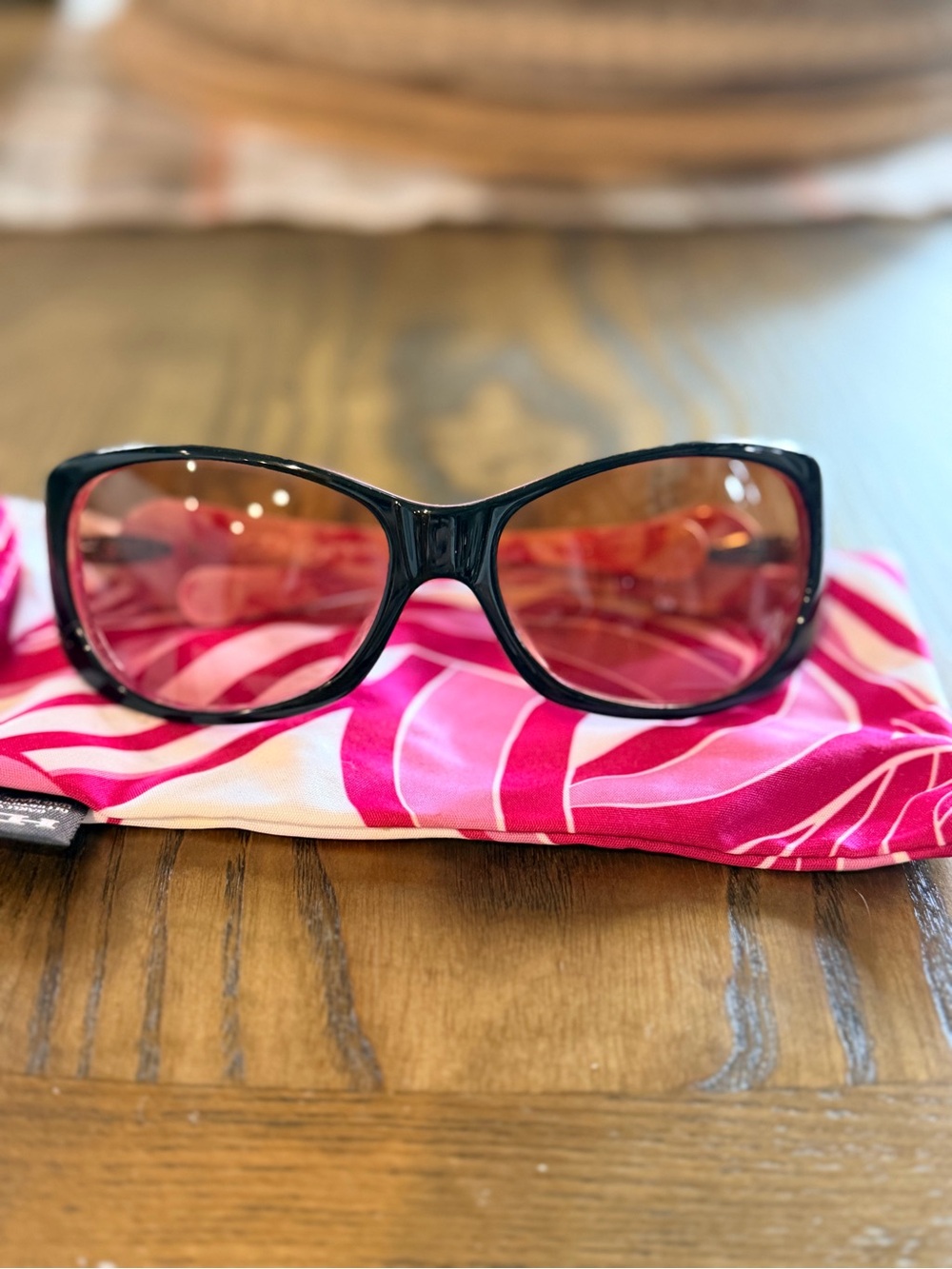 Oakley Women's Black Frame Sunglasses with Pink Gradient Lenses